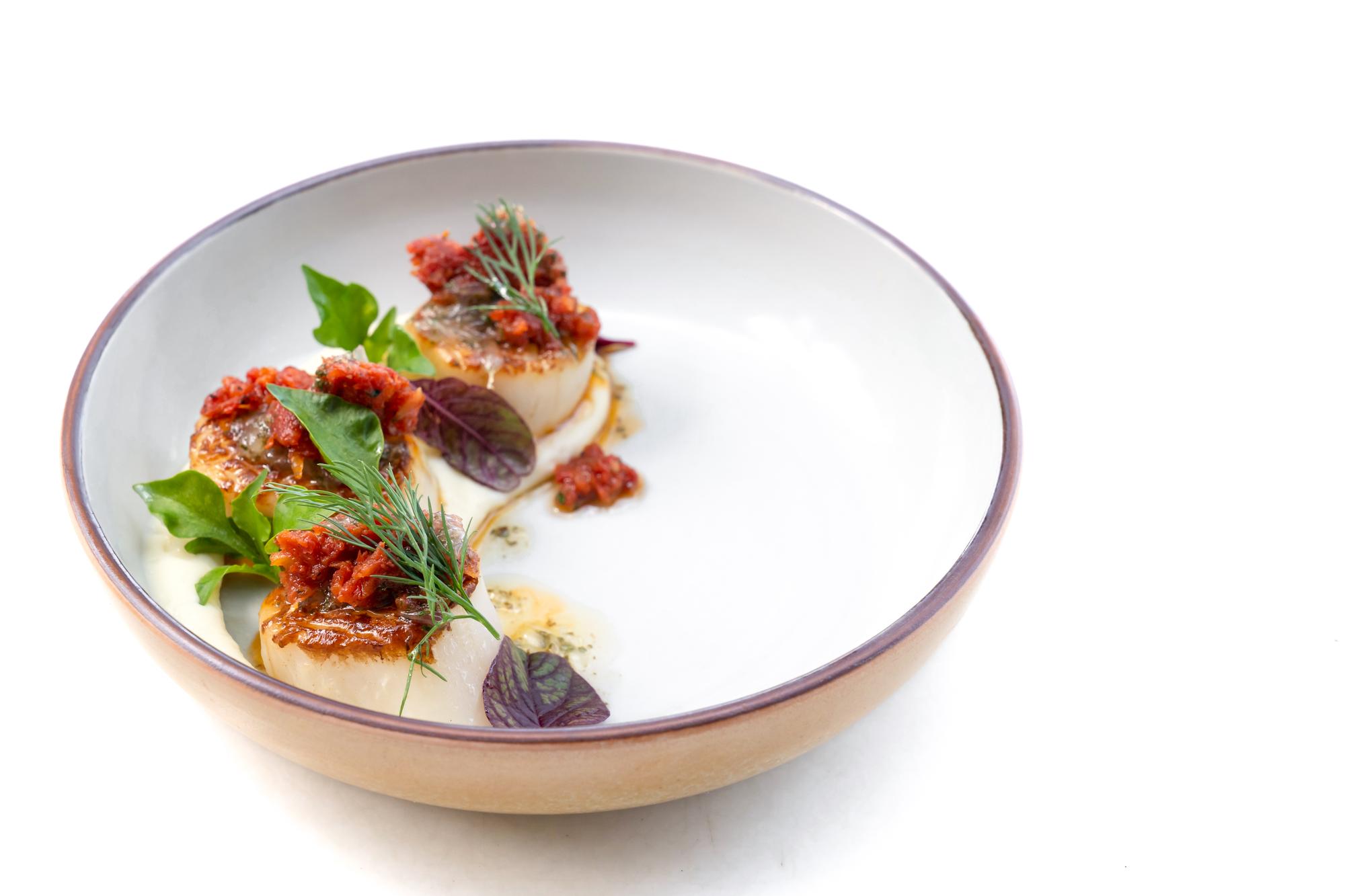 Finished main course on ceramic plate